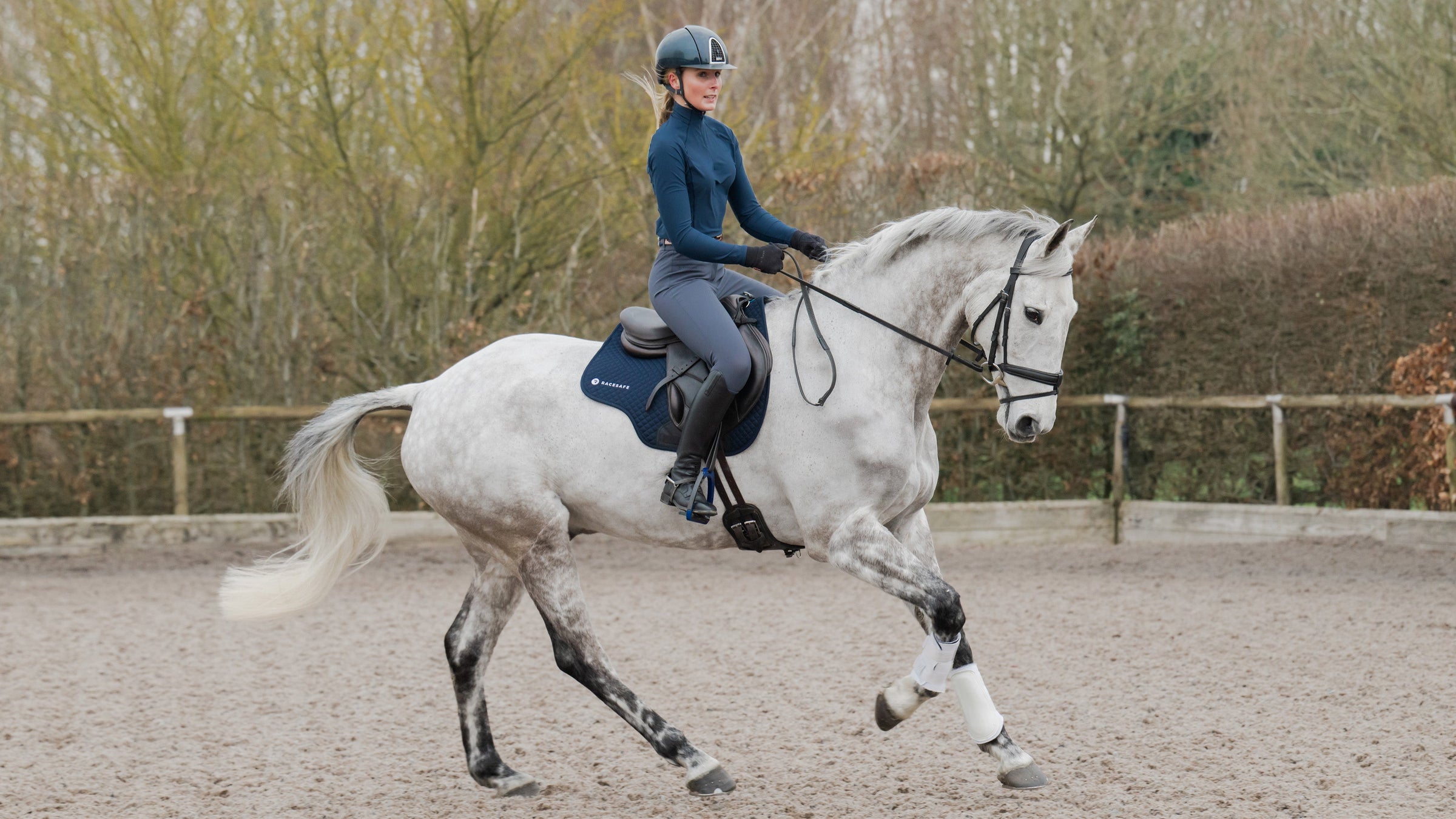 Grey Horse and Rider Cantering